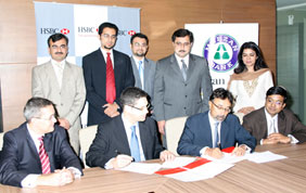Seated from left to right are: Mr. John L Scott (Regional Head PCM FI, HSBC), Mr. Paul Edgar (HSBC Regional Head of Global Transaction Banking, HSBC), Mr. Arif Ul Islam (COO Meezan Bank), Mr. Abdullah Ahmed (EVP- Treasury and FI, Meezan Bank). Back row: Mr. Sohail Naseem (RM PCM FI, HSBC), Mr. Kashif Rauf (RM PCM FI, HSBC), Mr. Salman Khan (VP FI, Meezan Bank), Mr. Usman J Khan (Head of CMB & GB, HSBC) and Ms. Nadira Saeed (Head of CIB, HSBC). 