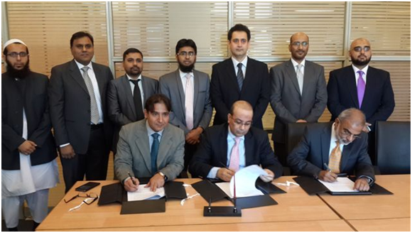 Seen in the photograph are (Sitting from L to R): Dr. Humayon Dar, Edbiz Consulting & HD Mudarabah, Dr. Saeed Ahmed, Director SBP and Mr. Irfan Siddiqui, President & CEO - Meezan Bank.