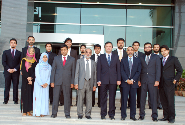 Mr. Muhammad Ali Malik (Director of Domestic Markets and Monetary Management Department – State Bank of Pakistan) inaugurates the dealing room at Meezan Bank’s new Head Office. Also seen in the picture are Mr. Irfan Siddiqui (President & CEO - Meezan Bank), Mr. Ariful Islam (COO – Meezan Bank), Mr. Abdullah Ahmed (Head of Treasury & Financial Institutions – Meezan Bank), and Mr. Syed Amir Ali (Head of Investment Banking) along with the Treasury dealing room staff members.