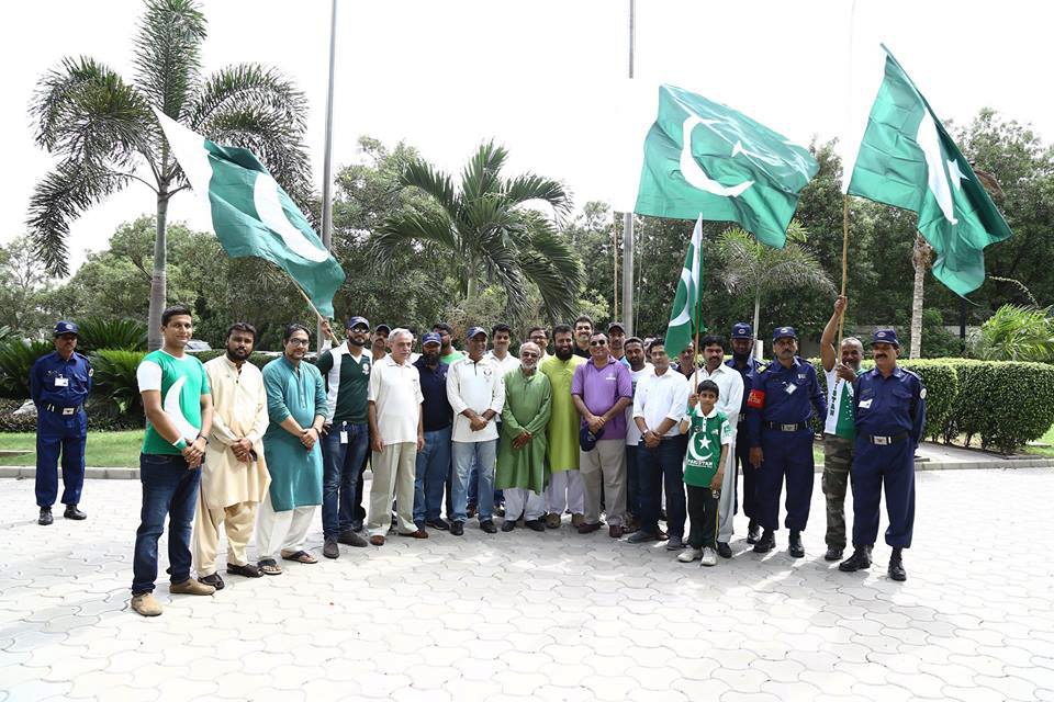 Meezan Bank's team celebrated 70 years of the motherland's Independence at its Head Office with great zeal. A flag hoisting ceremony was organized at the Bank's premises today, which was attended by the Founding President & CEO of Meezan Bank - Mr. Irfan Siddiqui, senior management team of the Bank and staff stationed at Meezan House with their families. Followed by the recitation of Holy Quran and the National Anthem, flag hoisting and cake cutting ceremonies were arranged. To honour the 70 years of Pakistan, a small group of Meezan family members majorly comprising of the Bank's cricket team also organized a small rally from Nazimabad to Meezan House